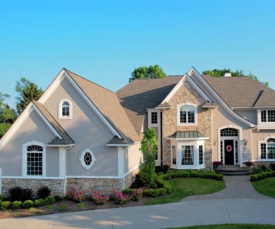Welcome to this stunning estate in the prestigious, gated on Oakhurst Golf and Country Club in Michigan - for sale on GolfHomes.com, golf home, golf lot