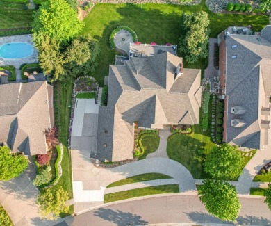 Welcome to this stunning estate in the prestigious, gated on Oakhurst Golf and Country Club in Michigan - for sale on GolfHomes.com, golf home, golf lot
