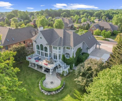 Welcome to this stunning estate in the prestigious, gated on Oakhurst Golf and Country Club in Michigan - for sale on GolfHomes.com, golf home, golf lot