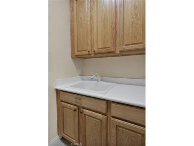 LOCATED IN APPLE VALLEY'S PREMIER 55+ GATED COMMUNITY! on Ashwood Golf Course in California - for sale on GolfHomes.com, golf home, golf lot