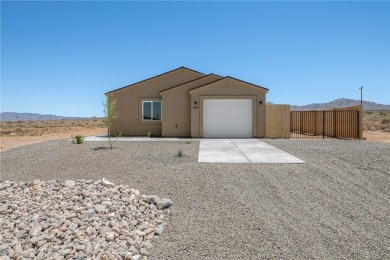 This BRAND NEW 2-bedroom 2 bath home is located in the quiet on Valle Vista Golf Course in Arizona - for sale on GolfHomes.com, golf home, golf lot