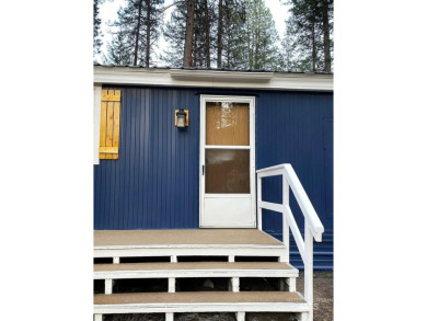 This newly remodeled manufactured home offers a modern and on Terrace Lakes Golf Resort in Idaho - for sale on GolfHomes.com, golf home, golf lot