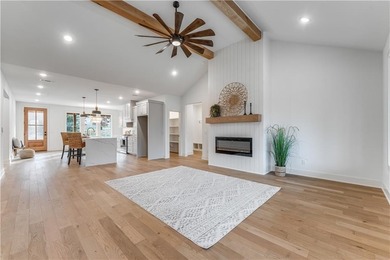 Open  floor plan with beamed vaulted ceiling. The split floor on Bella Vista - Metfield Golf Complex and Country Club in Arkansas - for sale on GolfHomes.com, golf home, golf lot
