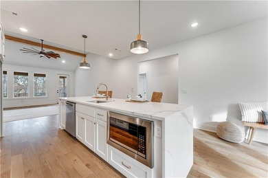 Open  floor plan with beamed vaulted ceiling. The split floor on Bella Vista - Metfield Golf Complex and Country Club in Arkansas - for sale on GolfHomes.com, golf home, golf lot