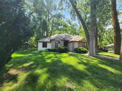 Don't miss this beautifully updated home in the highly on Dakota Dunes Country Club in South Dakota - for sale on GolfHomes.com, golf home, golf lot