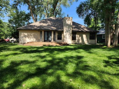 Don't miss this beautifully updated home in the highly on Dakota Dunes Country Club in South Dakota - for sale on GolfHomes.com, golf home, golf lot