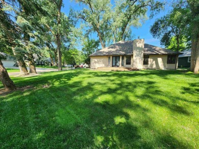 Don't miss this beautifully updated home in the highly on Dakota Dunes Country Club in South Dakota - for sale on GolfHomes.com, golf home, golf lot