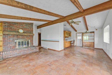 Rare opportunity! This 3 bed, 2 bath fixer-upper sits on over 2 on Baraboo Country Club in Wisconsin - for sale on GolfHomes.com, golf home, golf lot