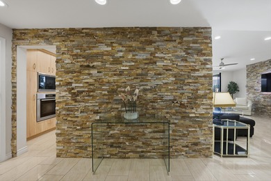 This spacious popular dual primary-bedroom suite floor plan has on Desert Island Golf and Country Club in California - for sale on GolfHomes.com, golf home, golf lot