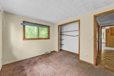 Rare opportunity! This 3 bed, 2 bath fixer-upper sits on over 2 on Baraboo Country Club in Wisconsin - for sale on GolfHomes.com, golf home, golf lot