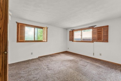 Rare opportunity! This 3 bed, 2 bath fixer-upper sits on over 2 on Baraboo Country Club in Wisconsin - for sale on GolfHomes.com, golf home, golf lot