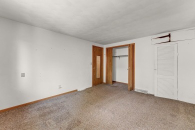 Rare opportunity! This 3 bed, 2 bath fixer-upper sits on over 2 on Baraboo Country Club in Wisconsin - for sale on GolfHomes.com, golf home, golf lot