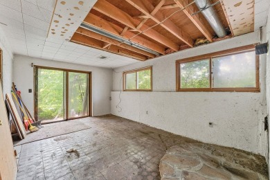 Rare opportunity! This 3 bed, 2 bath fixer-upper sits on over 2 on Baraboo Country Club in Wisconsin - for sale on GolfHomes.com, golf home, golf lot