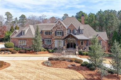 Rustic elegance is realized in this five bedroom, seven and a on The River Club in Georgia - for sale on GolfHomes.com, golf home, golf lot