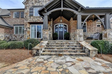 Rustic elegance is realized in this five bedroom, seven and a on The River Club in Georgia - for sale on GolfHomes.com, golf home, golf lot