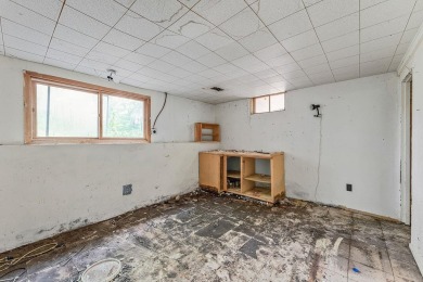 Rare opportunity! This 3 bed, 2 bath fixer-upper sits on over 2 on Baraboo Country Club in Wisconsin - for sale on GolfHomes.com, golf home, golf lot