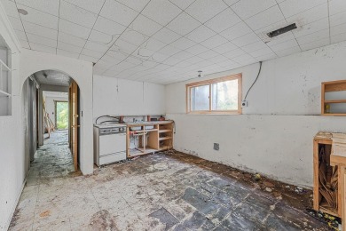 Rare opportunity! This 3 bed, 2 bath fixer-upper sits on over 2 on Baraboo Country Club in Wisconsin - for sale on GolfHomes.com, golf home, golf lot