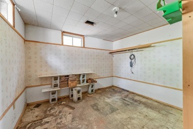 Rare opportunity! This 3 bed, 2 bath fixer-upper sits on over 2 on Baraboo Country Club in Wisconsin - for sale on GolfHomes.com, golf home, golf lot