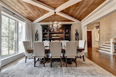 Rustic elegance is realized in this five bedroom, seven and a on The River Club in Georgia - for sale on GolfHomes.com, golf home, golf lot