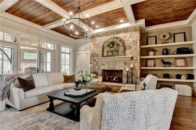 Rustic elegance is realized in this five bedroom, seven and a on The River Club in Georgia - for sale on GolfHomes.com, golf home, golf lot