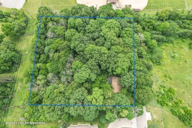 Rare opportunity! This 3 bed, 2 bath fixer-upper sits on over 2 on Baraboo Country Club in Wisconsin - for sale on GolfHomes.com, golf home, golf lot