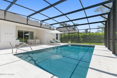 4 bedroom/ 3 bathroom pool home with a 3 car garage in Halifax on Halifax Plantation Golf Club in Florida - for sale on GolfHomes.com, golf home, golf lot