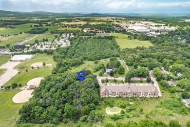 Rare opportunity! This 3 bed, 2 bath fixer-upper sits on over 2 on Baraboo Country Club in Wisconsin - for sale on GolfHomes.com, golf home, golf lot