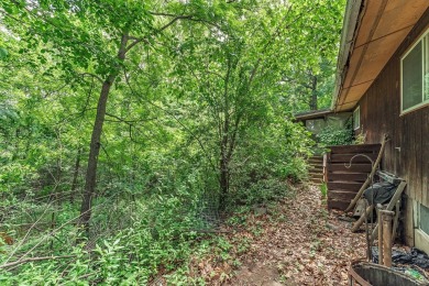Rare opportunity! This 3 bed, 2 bath fixer-upper sits on over 2 on Baraboo Country Club in Wisconsin - for sale on GolfHomes.com, golf home, golf lot