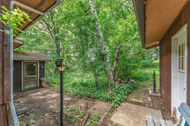 Rare opportunity! This 3 bed, 2 bath fixer-upper sits on over 2 on Baraboo Country Club in Wisconsin - for sale on GolfHomes.com, golf home, golf lot