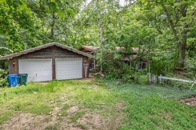 Rare opportunity! This 3 bed, 2 bath fixer-upper sits on over 2 on Baraboo Country Club in Wisconsin - for sale on GolfHomes.com, golf home, golf lot