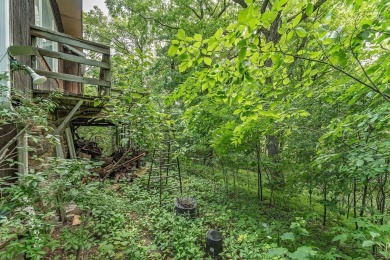 Rare opportunity! This 3 bed, 2 bath fixer-upper sits on over 2 on Baraboo Country Club in Wisconsin - for sale on GolfHomes.com, golf home, golf lot