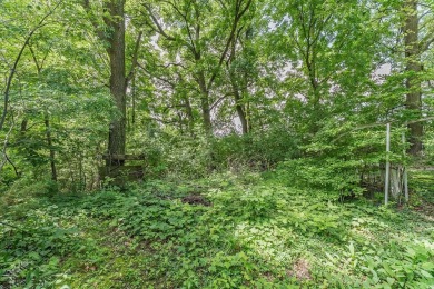 Rare opportunity! This 3 bed, 2 bath fixer-upper sits on over 2 on Baraboo Country Club in Wisconsin - for sale on GolfHomes.com, golf home, golf lot