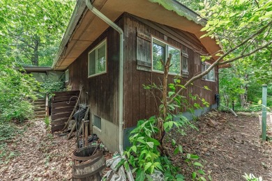 Rare opportunity! This 3 bed, 2 bath fixer-upper sits on over 2 on Baraboo Country Club in Wisconsin - for sale on GolfHomes.com, golf home, golf lot