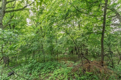 Rare opportunity! This 3 bed, 2 bath fixer-upper sits on over 2 on Baraboo Country Club in Wisconsin - for sale on GolfHomes.com, golf home, golf lot