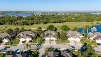 Nestled in the heart of Viera East Golf Course, this villa on Viera East Golf Club in Florida - for sale on GolfHomes.com, golf home, golf lot