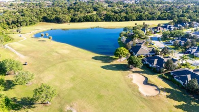 Nestled in the heart of Viera East Golf Course, this villa on Viera East Golf Club in Florida - for sale on GolfHomes.com, golf home, golf lot