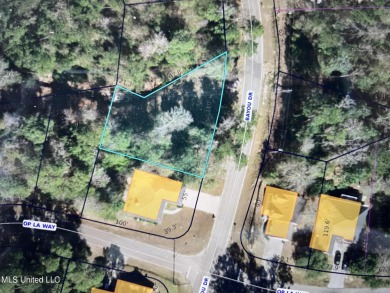 Build your dream home on this beautiful lot which is located in on Diamondhead Country Club in Mississippi - for sale on GolfHomes.com, golf home, golf lot
