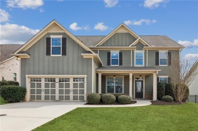 This stunning two-story home, featuring 5 bedrooms and 3 on Traditions of Braselton Golf Club in Georgia - for sale on GolfHomes.com, golf home, golf lot