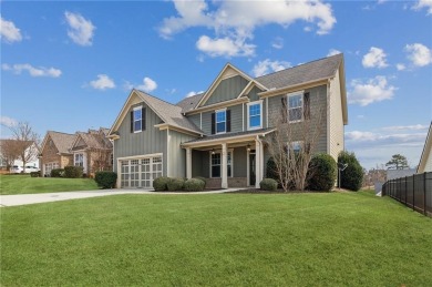 This stunning two-story home, featuring 5 bedrooms and 3 on Traditions of Braselton Golf Club in Georgia - for sale on GolfHomes.com, golf home, golf lot