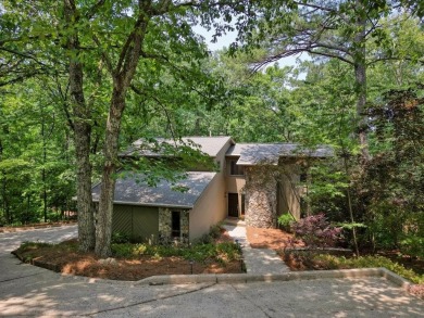 Impressive mid-century modern home in Johns Creek located at the on Rivermont Golf and Country Club in Georgia - for sale on GolfHomes.com, golf home, golf lot