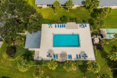 Welcome to your slice of paradise in the prestigious Palm-Aire on Palm Aire Country Club of Sarasota in Florida - for sale on GolfHomes.com, golf home, golf lot