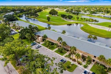 Welcome to your slice of paradise in the prestigious Palm-Aire on Palm Aire Country Club of Sarasota in Florida - for sale on GolfHomes.com, golf home, golf lot