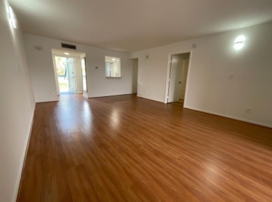 Beautiful 2BD/2BA condo in the peaceful Palm Springs 3 community on Oriole Golf and Tennis Club in Florida - for sale on GolfHomes.com, golf home, golf lot