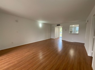 Beautiful 2BD/2BA condo in the peaceful Palm Springs 3 community on Oriole Golf and Tennis Club in Florida - for sale on GolfHomes.com, golf home, golf lot