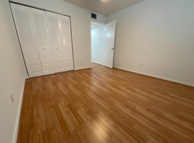 Beautiful 2BD/2BA condo in the peaceful Palm Springs 3 community on Oriole Golf and Tennis Club in Florida - for sale on GolfHomes.com, golf home, golf lot