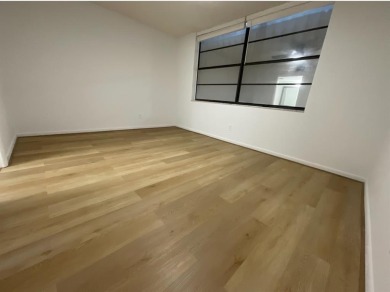 Beautiful 2BD/2BA condo in the peaceful Palm Springs 3 community on Oriole Golf and Tennis Club in Florida - for sale on GolfHomes.com, golf home, golf lot