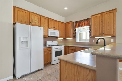 Welcome to this beautifully maintained 2-bedroom + office/bonus on Ashwood Golf Course in California - for sale on GolfHomes.com, golf home, golf lot