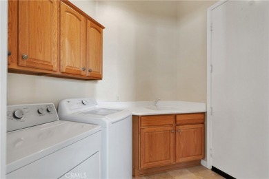 Welcome to this beautifully maintained 2-bedroom + office/bonus on Ashwood Golf Course in California - for sale on GolfHomes.com, golf home, golf lot