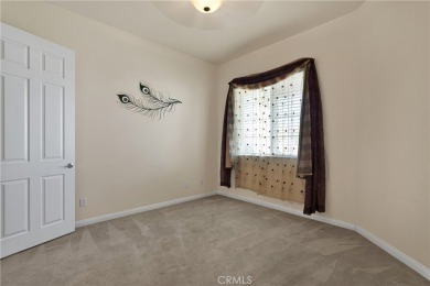 Welcome to this beautifully maintained 2-bedroom + office/bonus on Ashwood Golf Course in California - for sale on GolfHomes.com, golf home, golf lot
