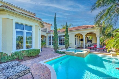 Welcome to this stunning Tuscan-inspired estate featuring an on The Tesoro Golf Course and Club in Florida - for sale on GolfHomes.com, golf home, golf lot